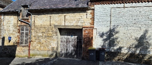 A building with a door AI-generated content may be incorrect.